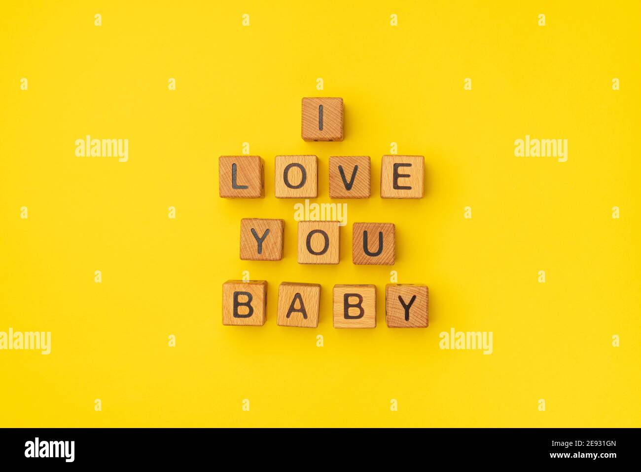 Wooden Cubes With The Phrase I Love You Baby On An Empty Colorful Yellow Background Words Of Love Are Made Of Letters From Wood For Your Girlfriend Boyfriend Wife Husband For Valentine S