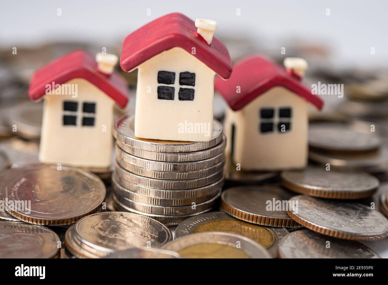 House on stack coins, mortgage home loan finance concept Stock Photo ...