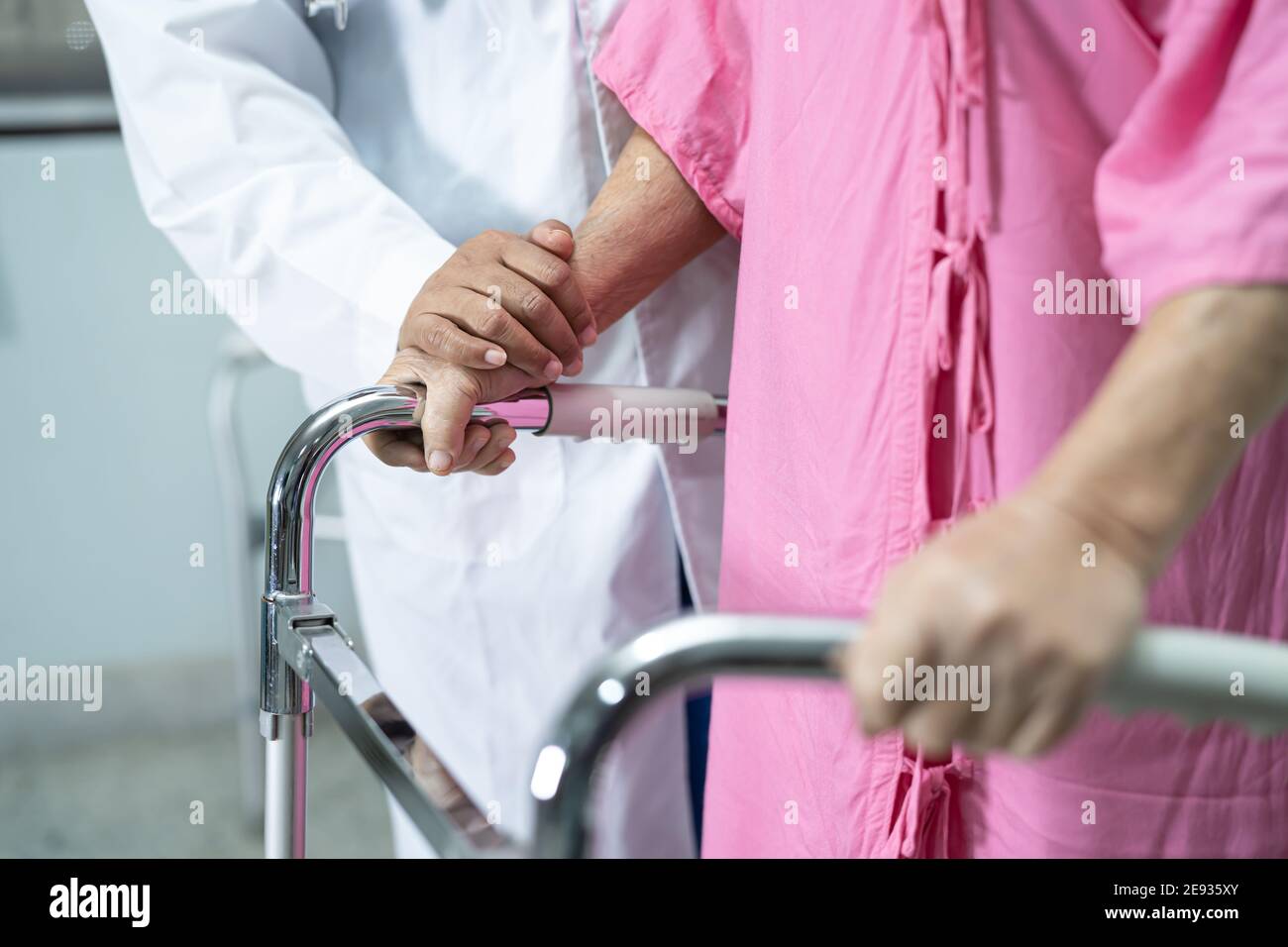Asian senior or elderly old lady woman patient walk with walker at ...