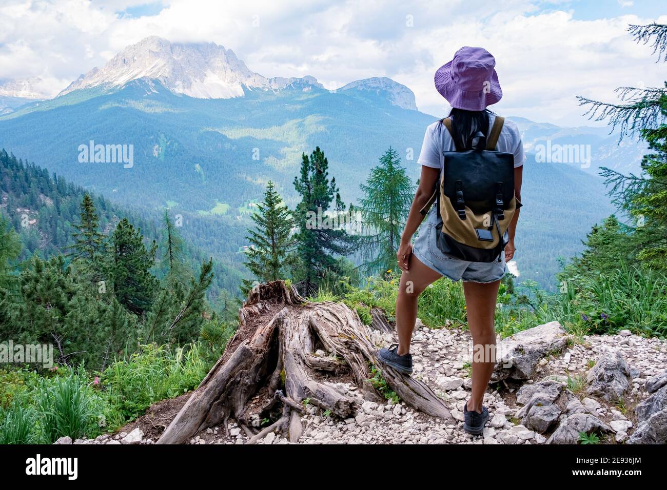 Tre Cime di Lavaredo , Italy Dolomites, The refuge Antonio Locatelli, with Tre Cime di Lavaredo in the background in the Italian Alps. Europe, woman hiking in the dolomites Stock Photo