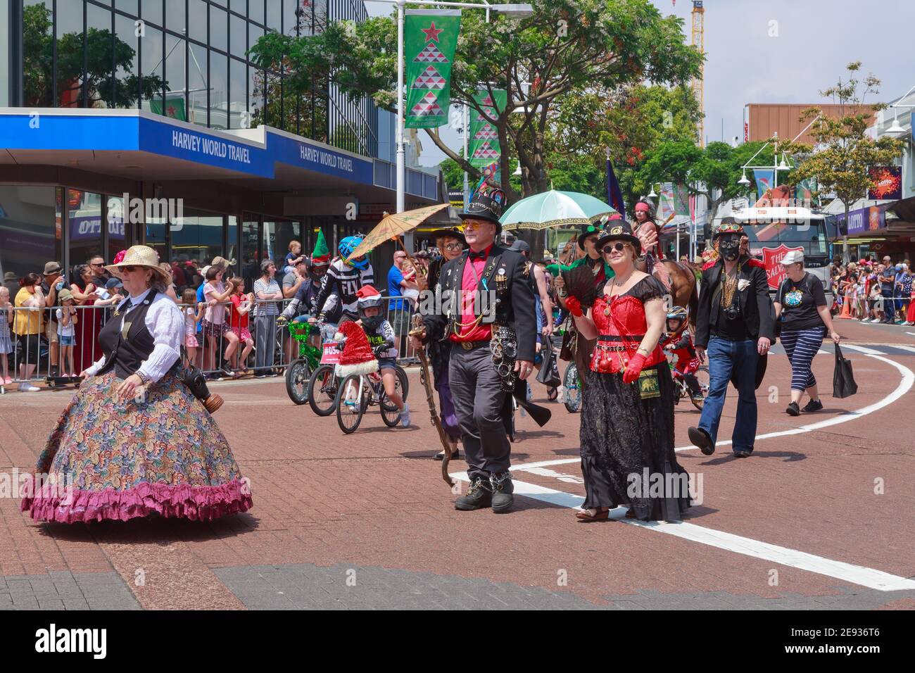 Steampunk fans in elaborate costumes marching down the street at a Christmas parade in Tauranga, New Zealand Stock Photo