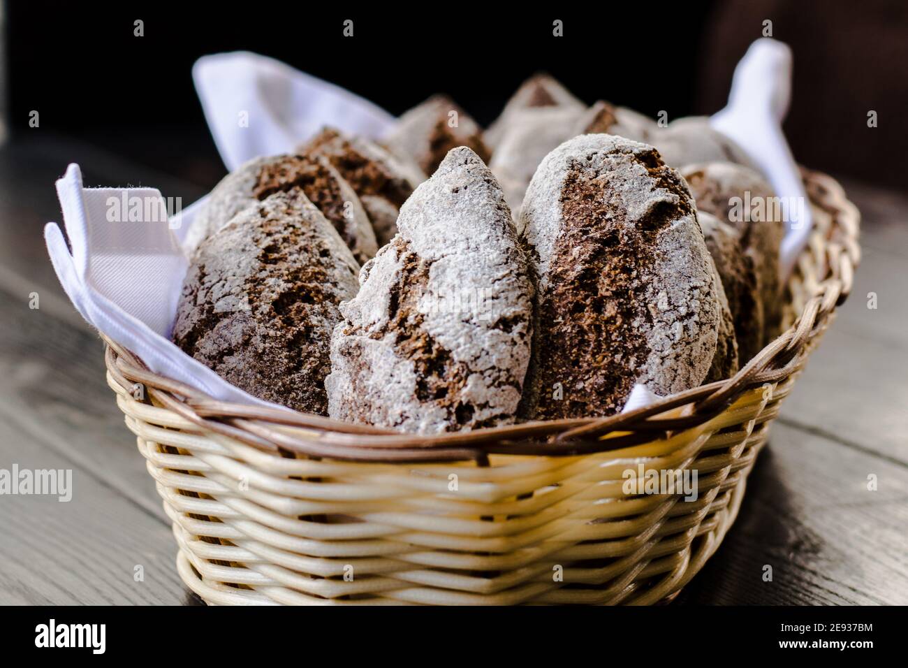 Small rye bread loafs in a basket at a restaurant Stock Photo Alamy
