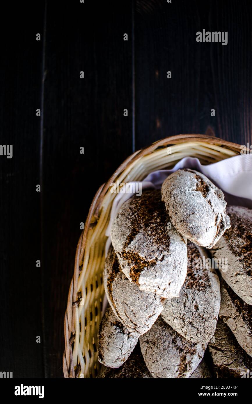 Small rye bread loafs in a basket at a restaurant Stock Photo Alamy