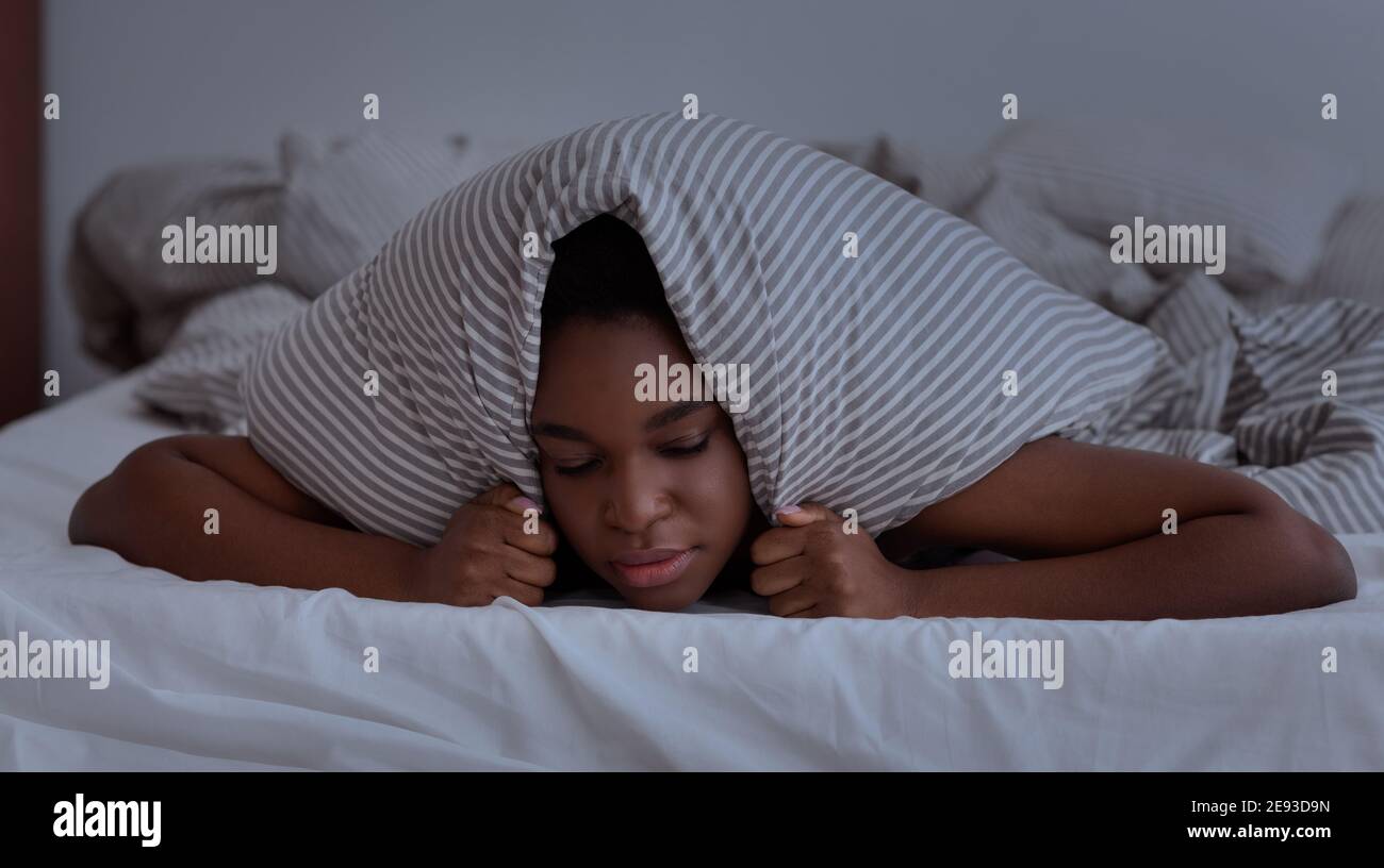 Neighbors interfere to sleep, noise, nightmares, problems and bad thoughts Stock Photo