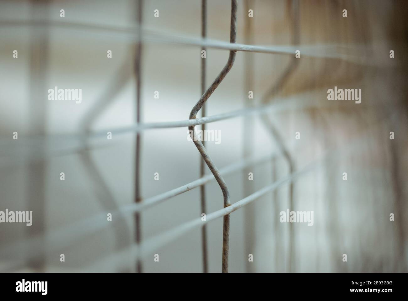 Closeup shot of metal street fence with depth blur and center focus ...