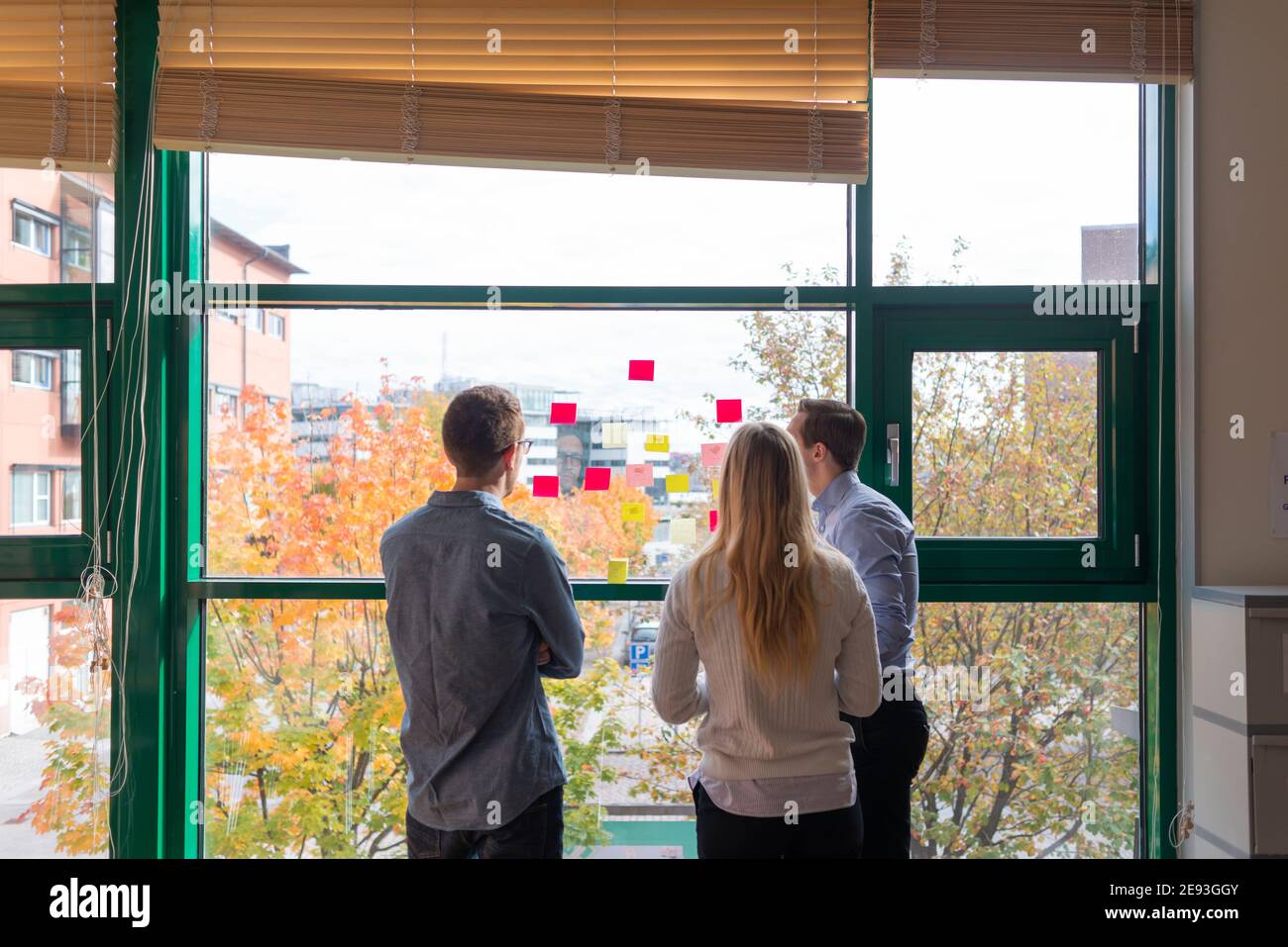 Mid adult man woman window hi-res stock photography and images - Alamy