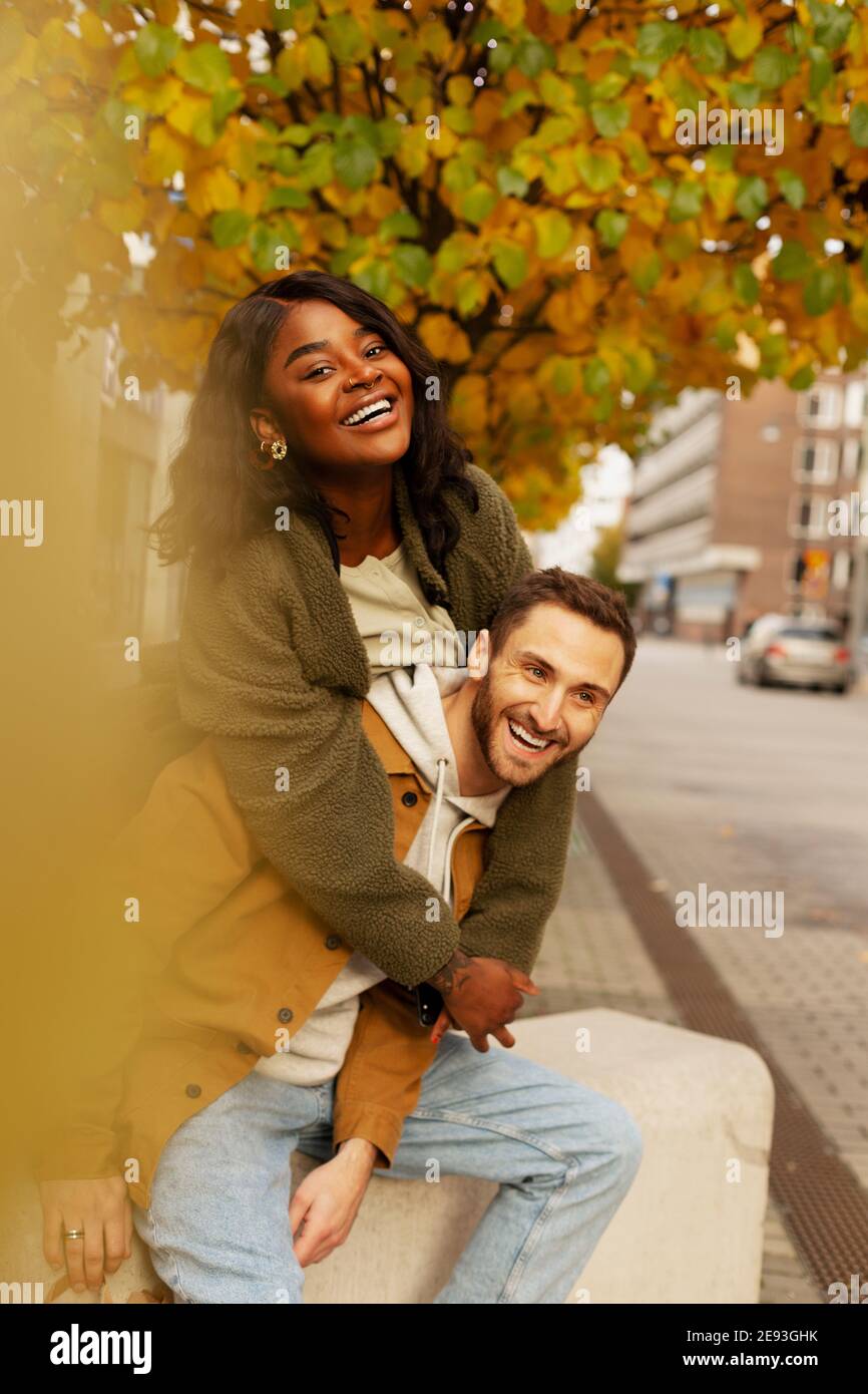 Young couple posing on street Stock Photo