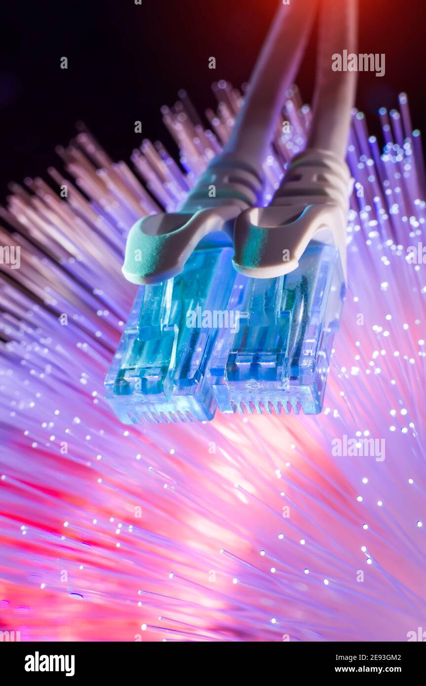 network cables with fiber optical background Stock Photo
