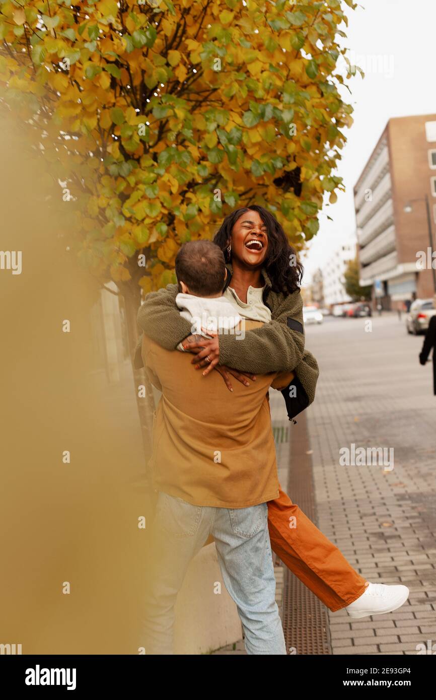 Three women friends hug autumn hi-res stock photography and images - Alamy