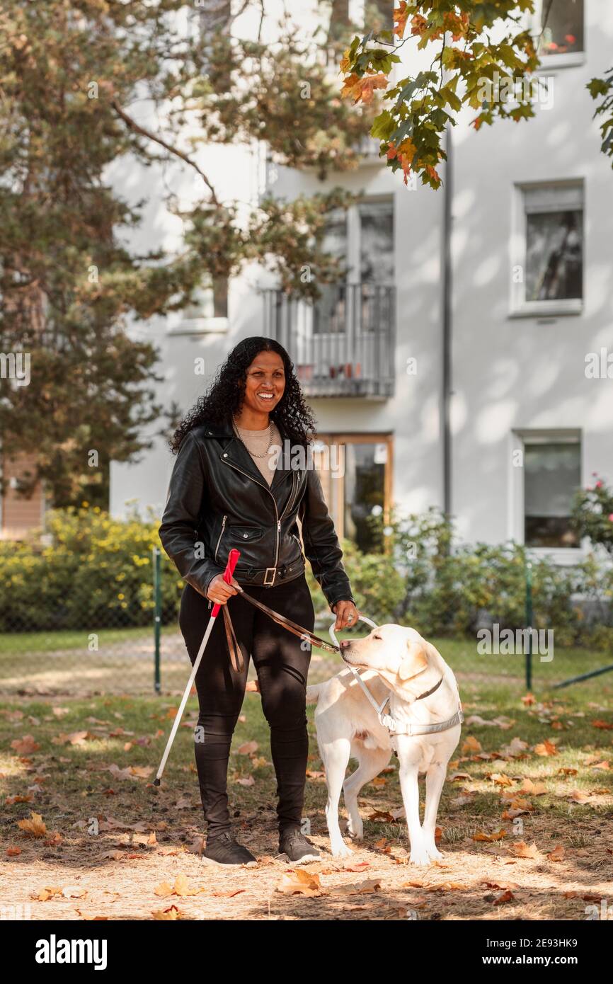 Visually Impaired Woman Smiling And Holding Guide Dog Stock Photo Alamy Visually Impaired Woman Smiling And Holding Guide Dog Stock Photo Alamy