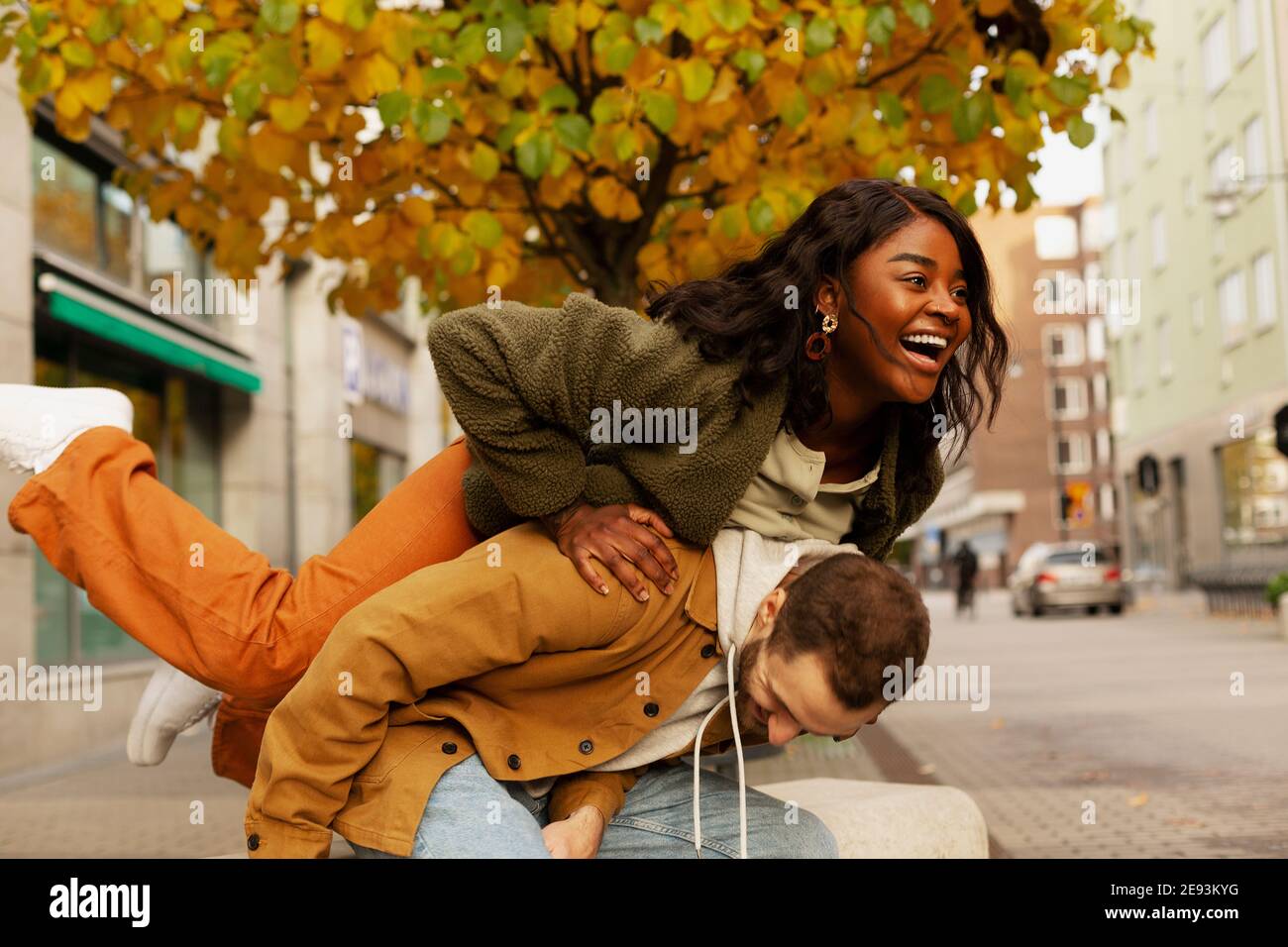 Young couple posing on street Stock Photo