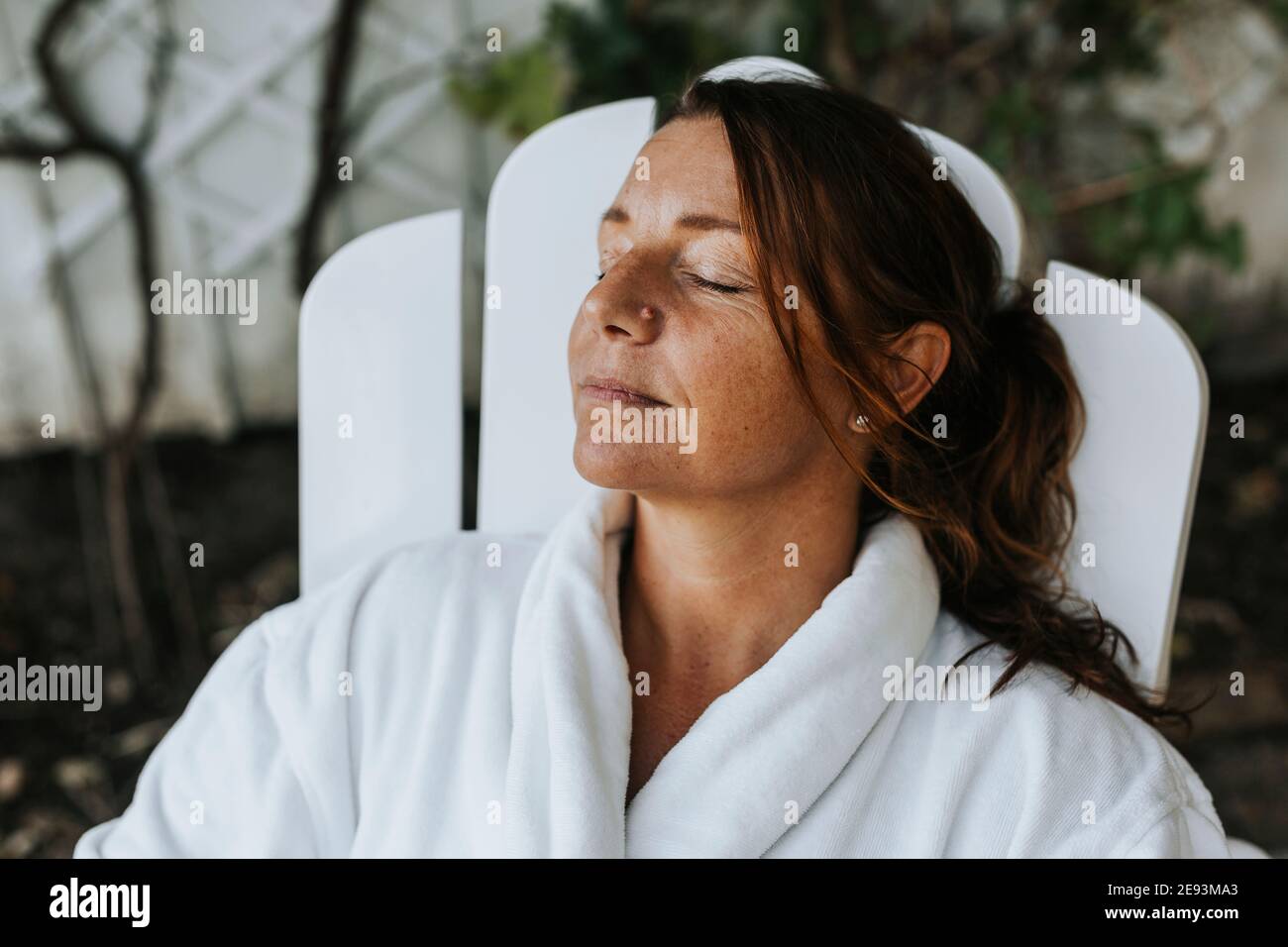 Woman relaxing with eyes closed Stock Photo - Alamy