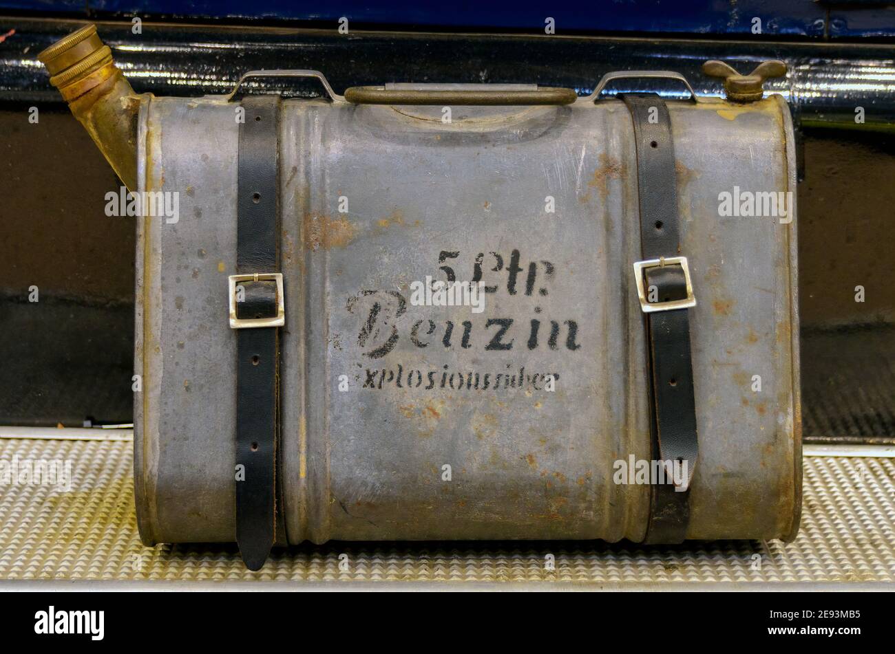 old reserve fuel tank of a classic car with leather belts Stock Photo