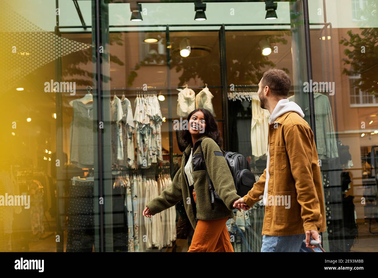 Young couple walking on shopping street Stock Photo