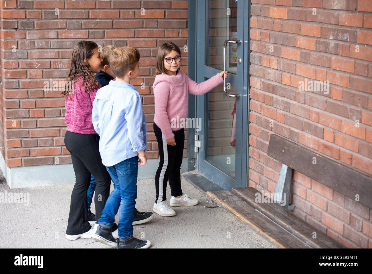 Children entering school Stock Photo