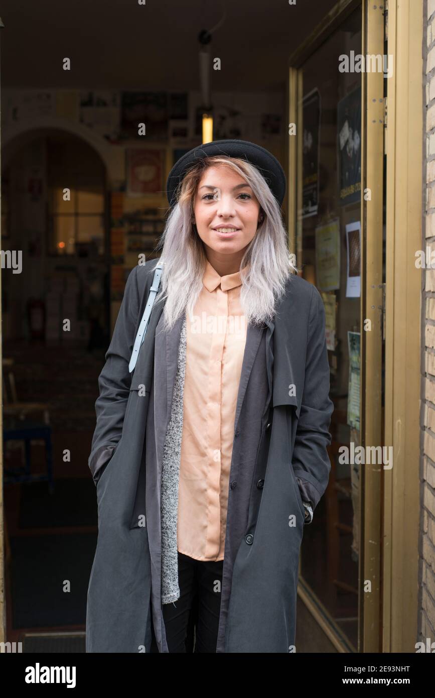 Young stylish woman looking at camera Stock Photo