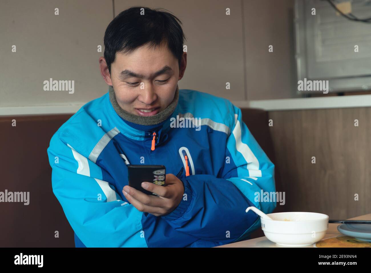 The use of mobile phones take-away member Stock Photo - Alamy
