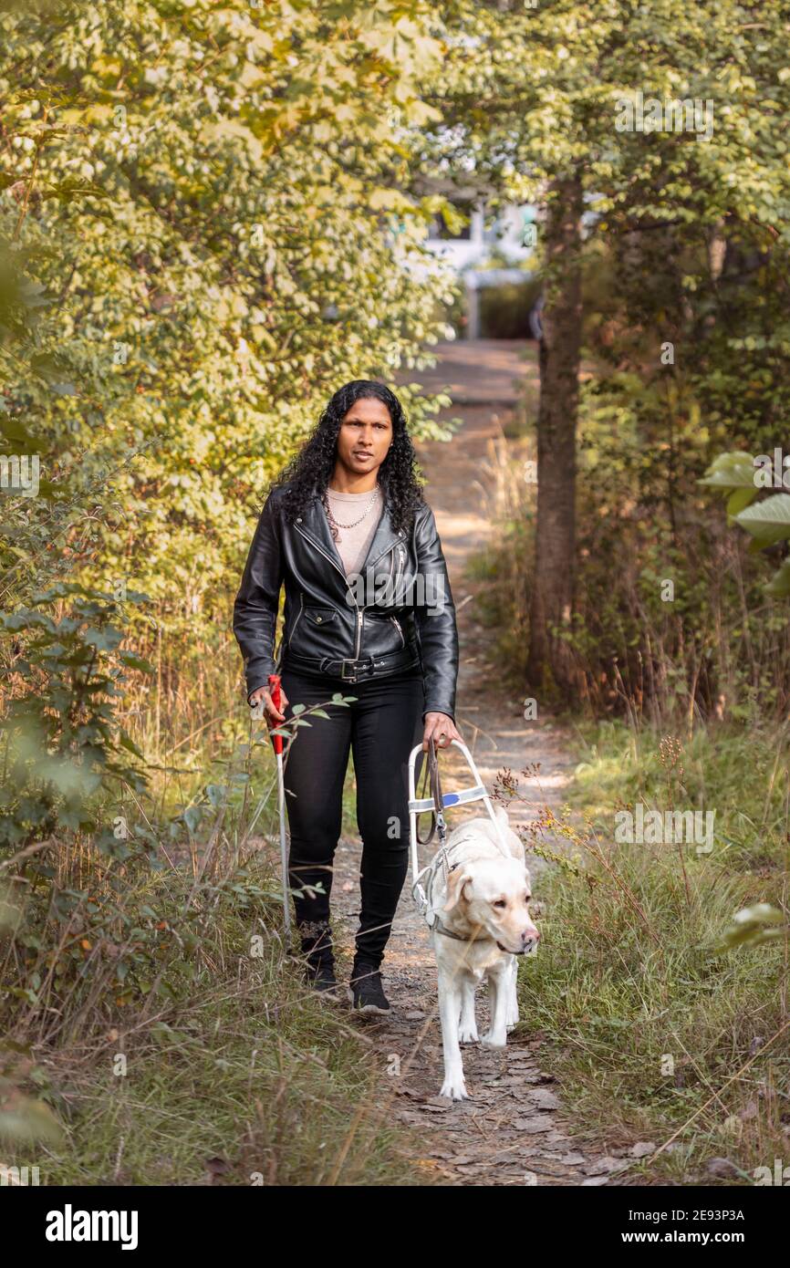 Woman walking park stockholm hi-res stock photography and images - Alamy