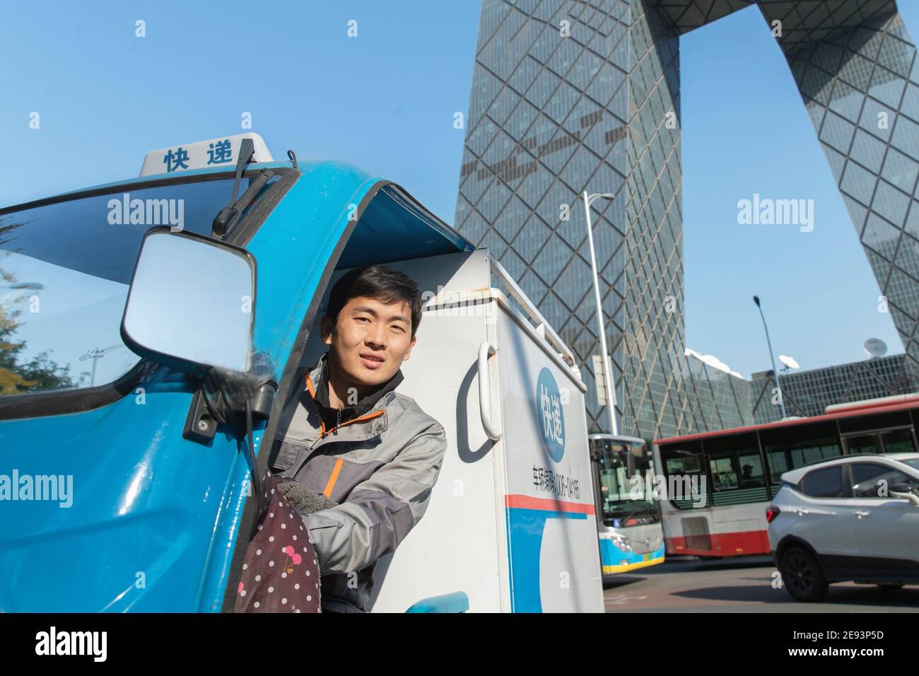 Work on the way driving tricycle Courier Stock Photo