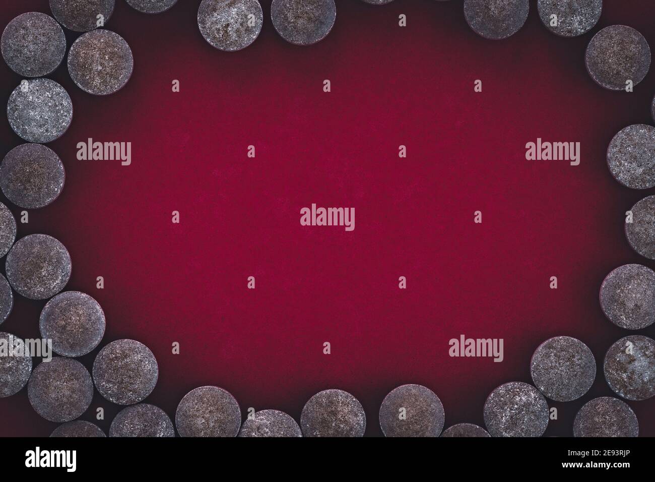 closeup of chelated iron tablets, with negative space. dietary concept