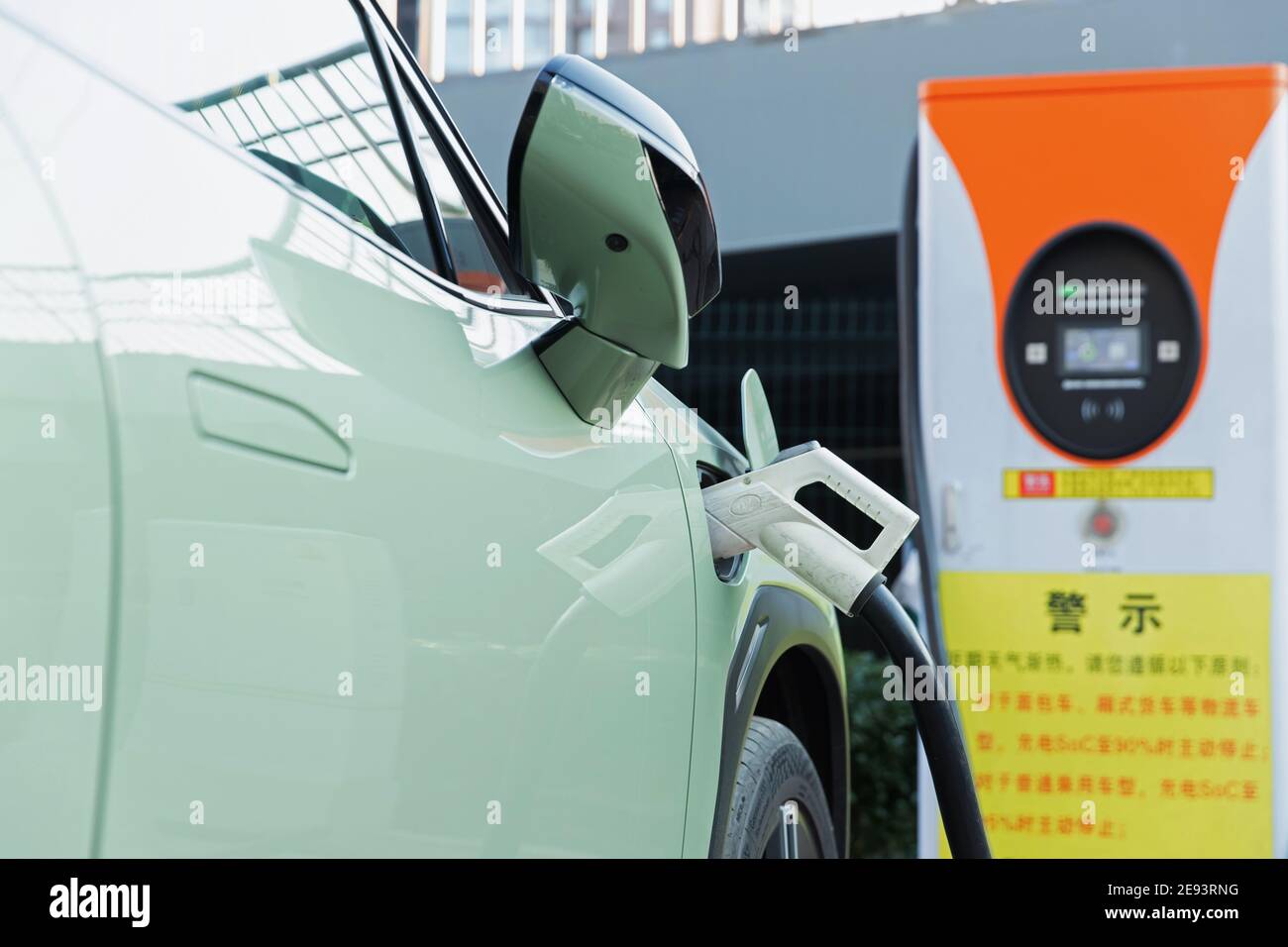 Electric vehicle charging Stock Photo Alamy