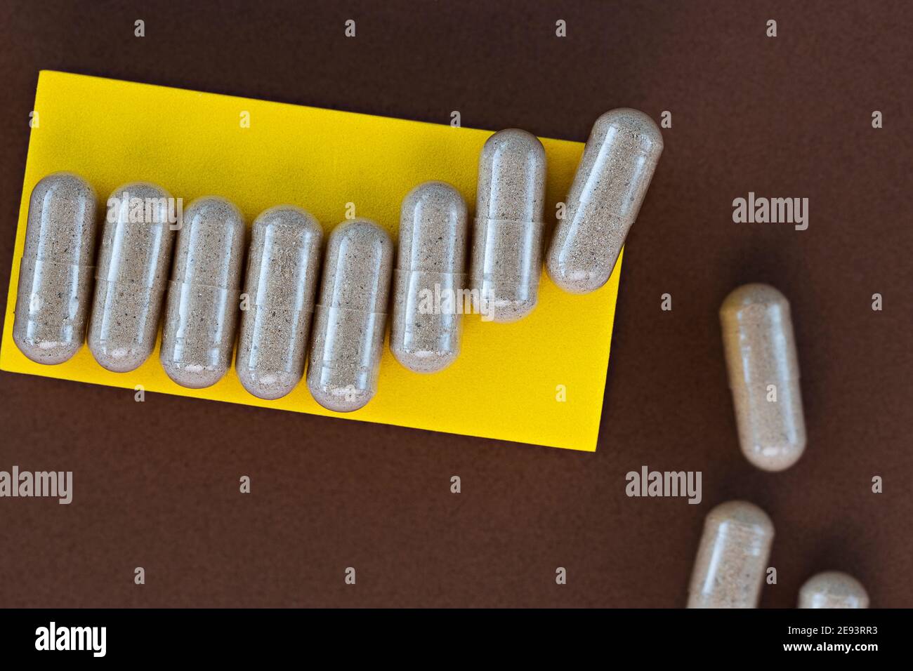 close-up of slippery elm capsules. dietary concept. dietary supplement topview. Stock Photo
