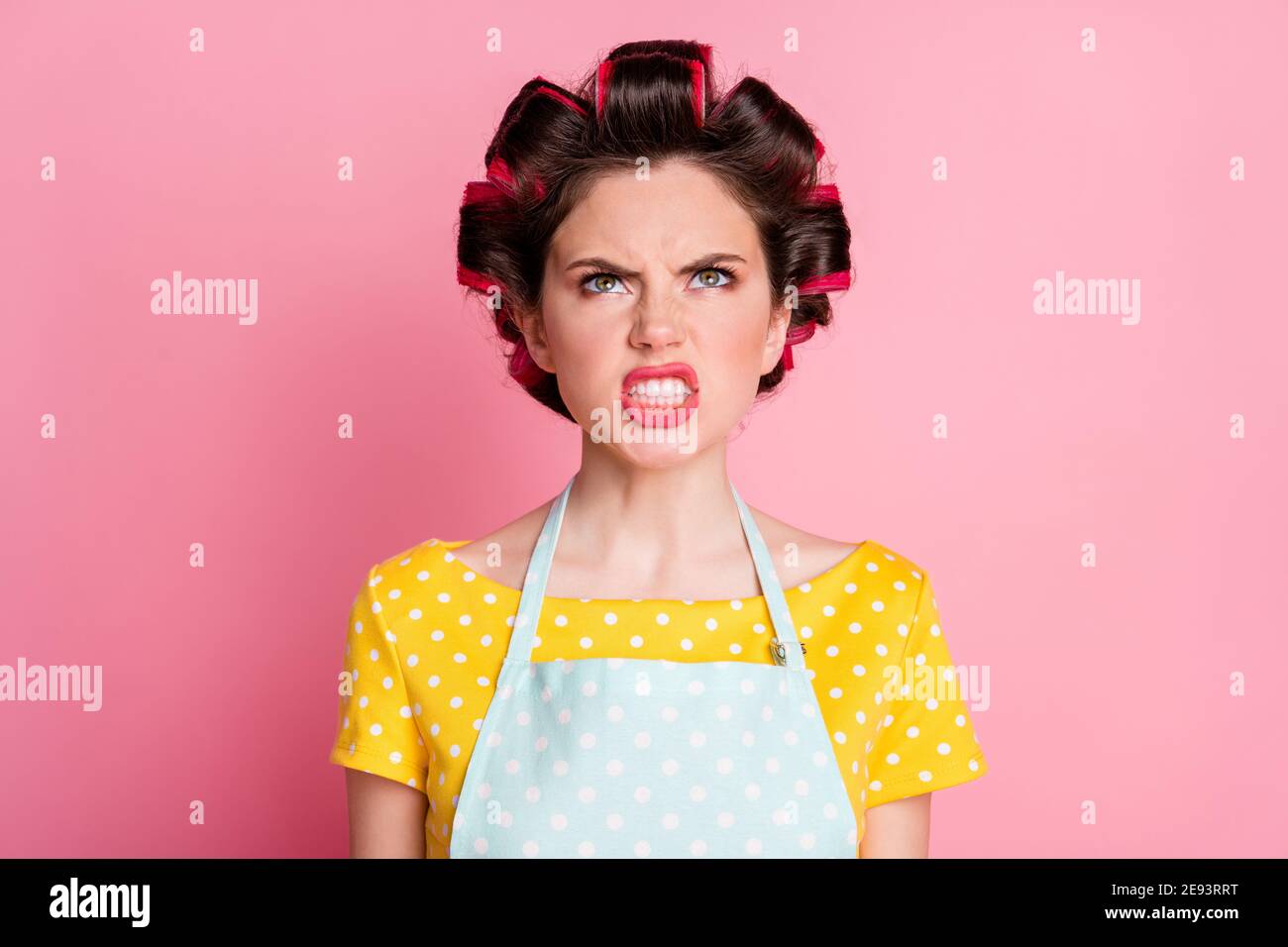 Close-up portrait of her she nice attractive crazy frustrated mad brown-haired housewife grimacing blame fail isolated on pink pastel color background Stock Photo