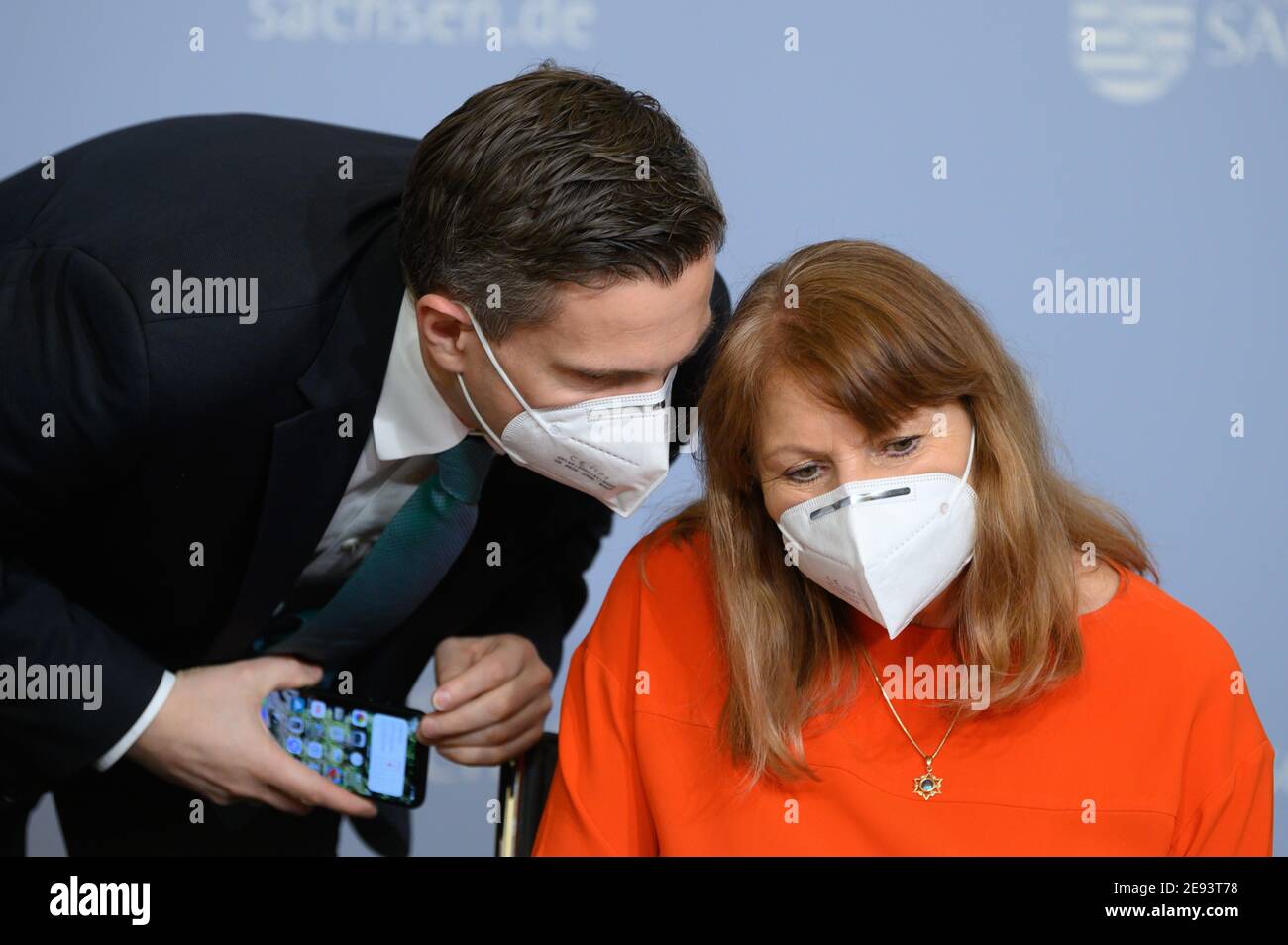 Dresden, Germany. 02nd Feb, 2021. Petra Köpping (SPD), Saxony's Minister of Social Affairs, and Martin Dulig (SPD), Saxony's Minister of Economics, wear FFP2 masks as they talk to each other at the State Chancellery before a press conference. Saxony is considering first Corona relaxations in the current lockdown from 15 February 2021. Credit: Sebastian Kahnert/dpa-Zentralbild/dpa/Alamy Live News Stock Photo