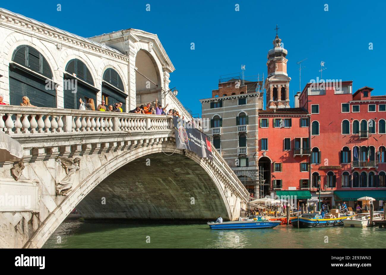 The Rialto Bridge is the oldest of the four bridges spanning the Grand Canal in Venice, Italy. Stock Photo