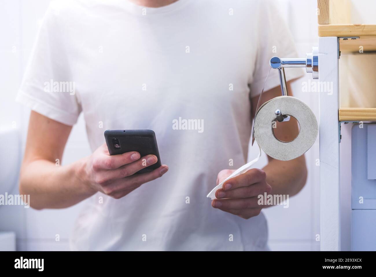 Young Man Sitting On Toilet Stock Photos & Young Man 