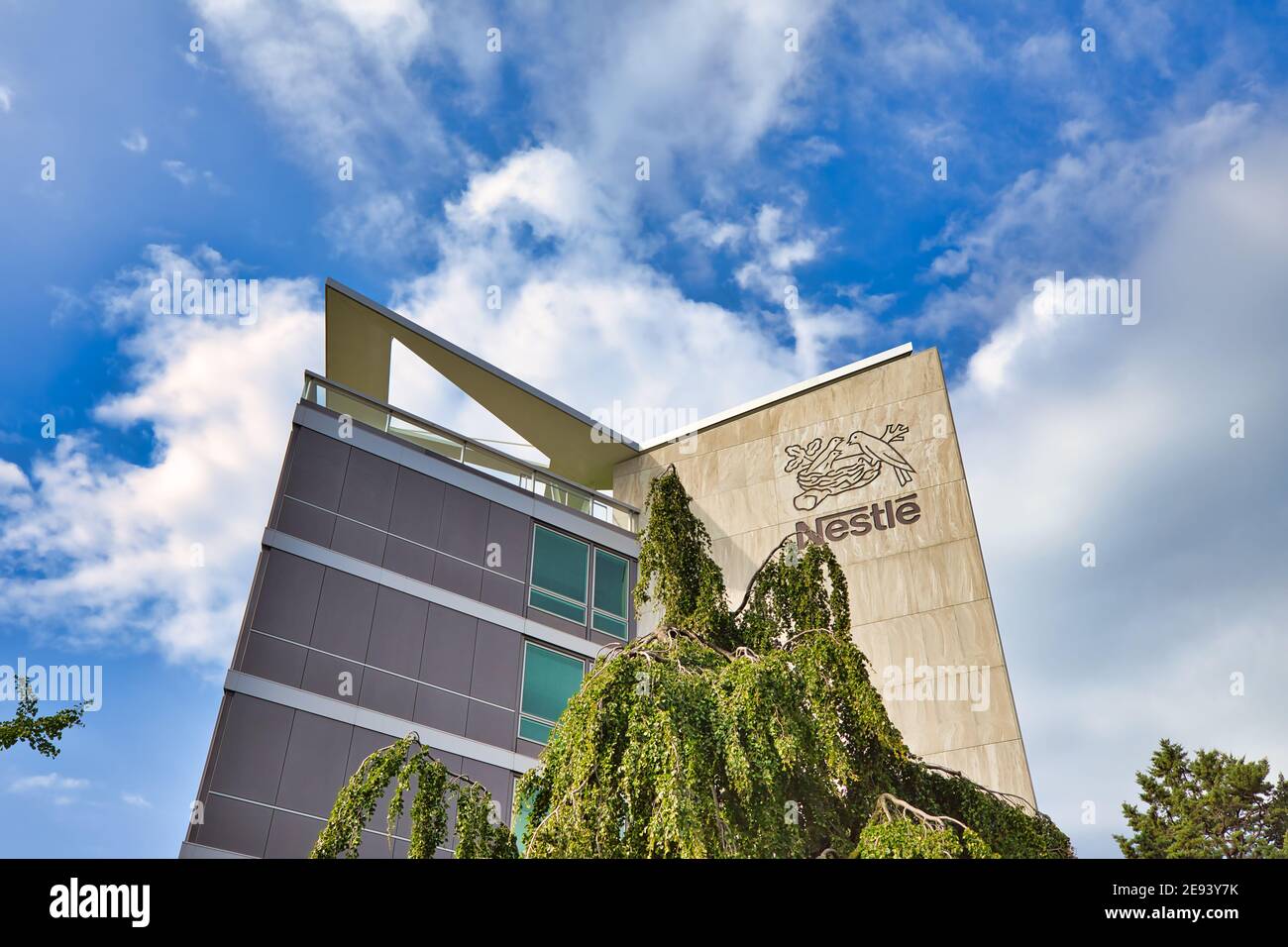 Vevey, Switzerland - August 14, 2020: Nestle Headquarter building office and Logo. Nestle is largest multinational company in food sector in the world Stock Photo