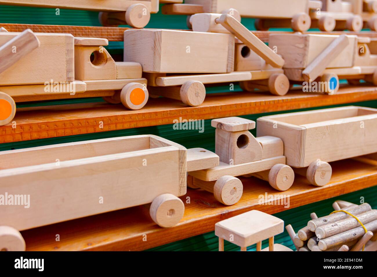 Children's eco handmade vintage wooden toys various models of train, truck,  car, vehicle Stock Photo - Alamy