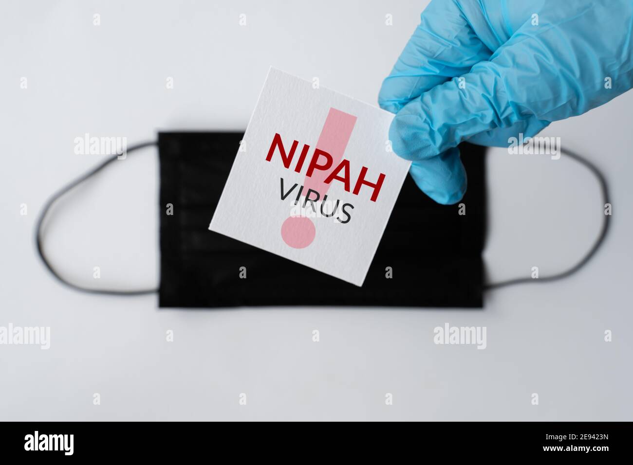 Nipah virus. Nipah Henipavirus is a newly emerging bat-borne virus that causes acute respiratory illness. nipah virus infection, protective medical fa Stock Photo