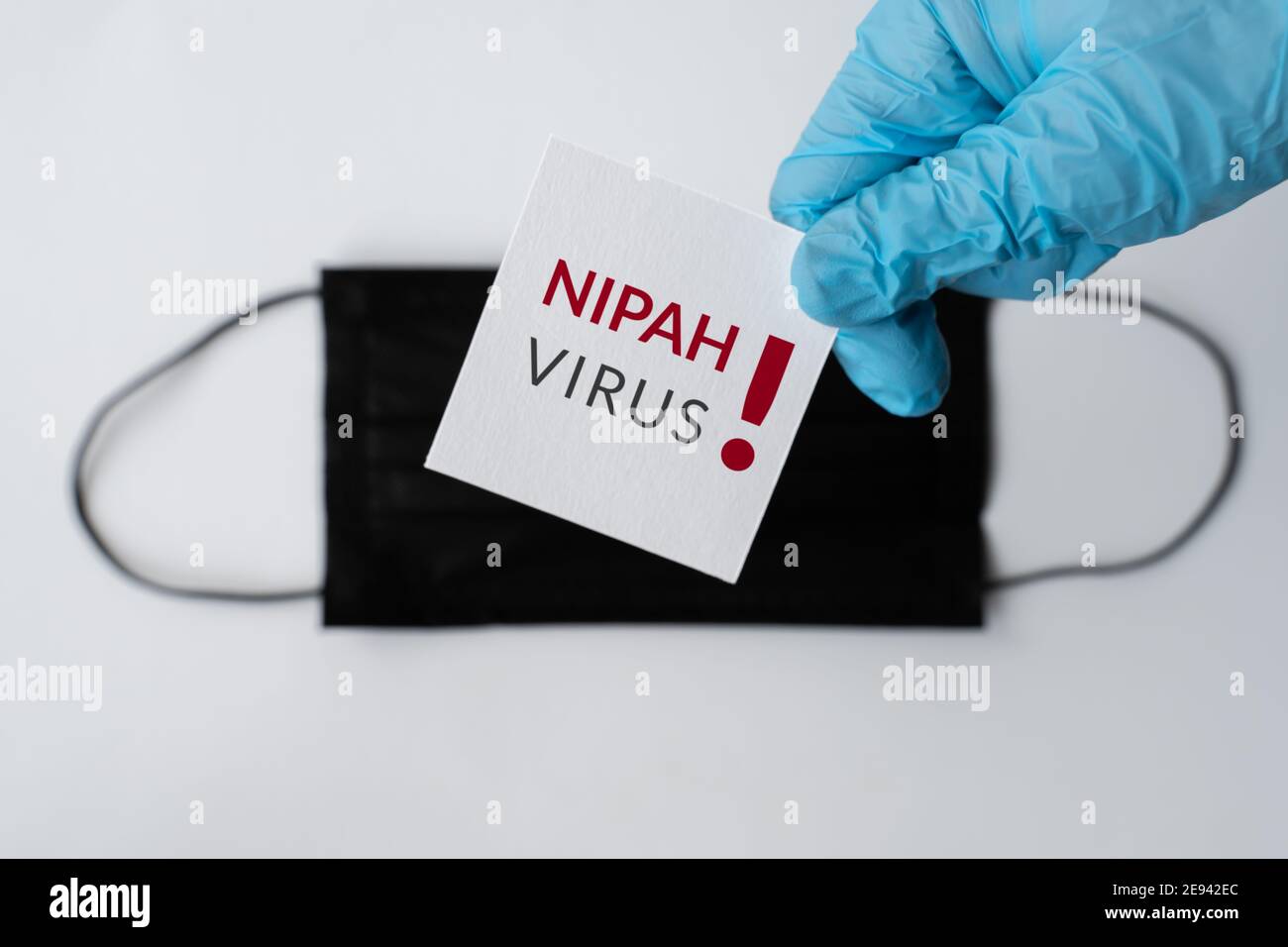 Nipah virus. Nipah Henipavirus is a newly emerging bat-borne virus that causes acute respiratory illness. nipah virus infection, protective medical fa Stock Photo