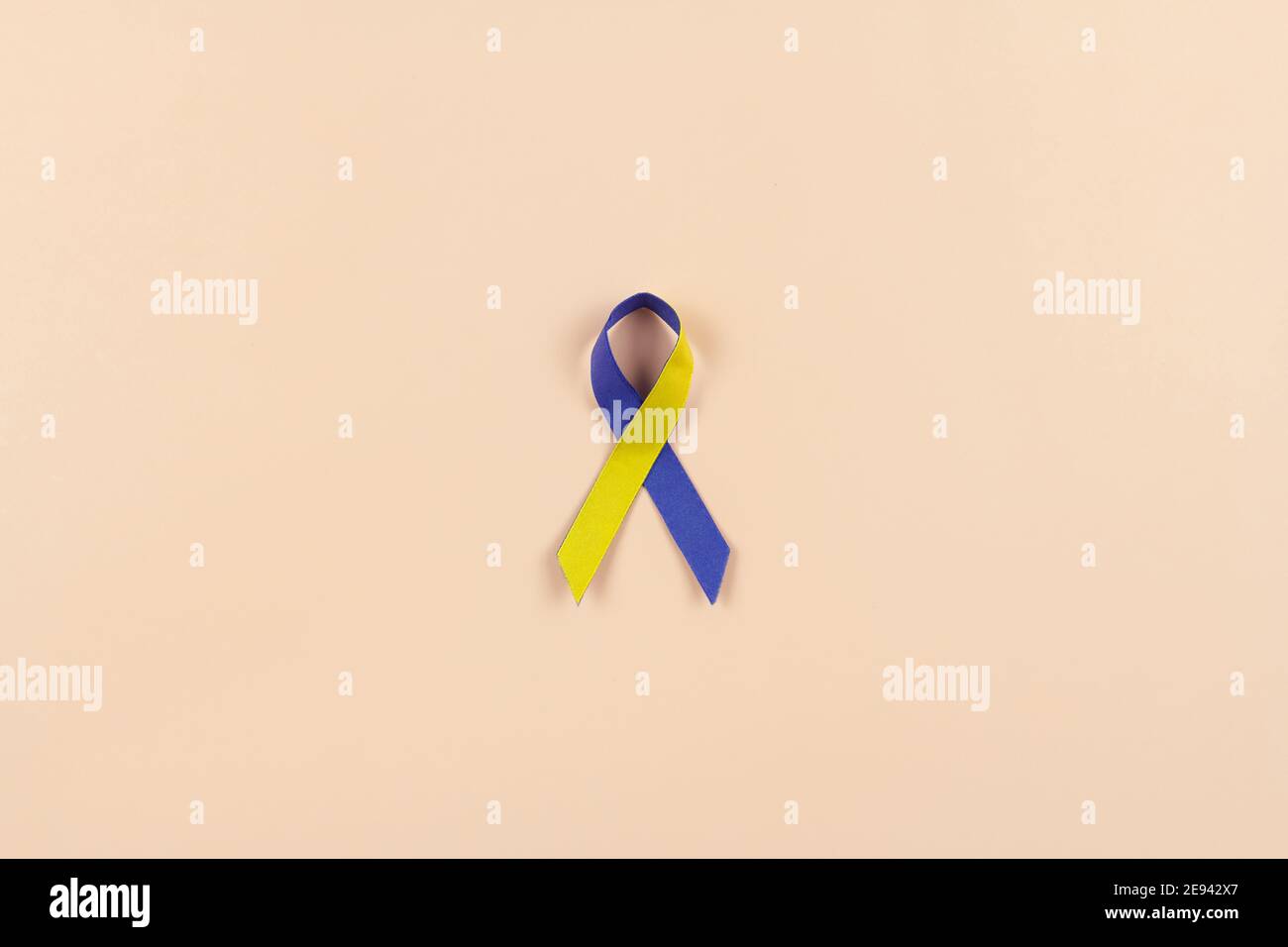 The Blue and yellow ribbon for World Down Syndrome Day Stock Photo - Alamy
