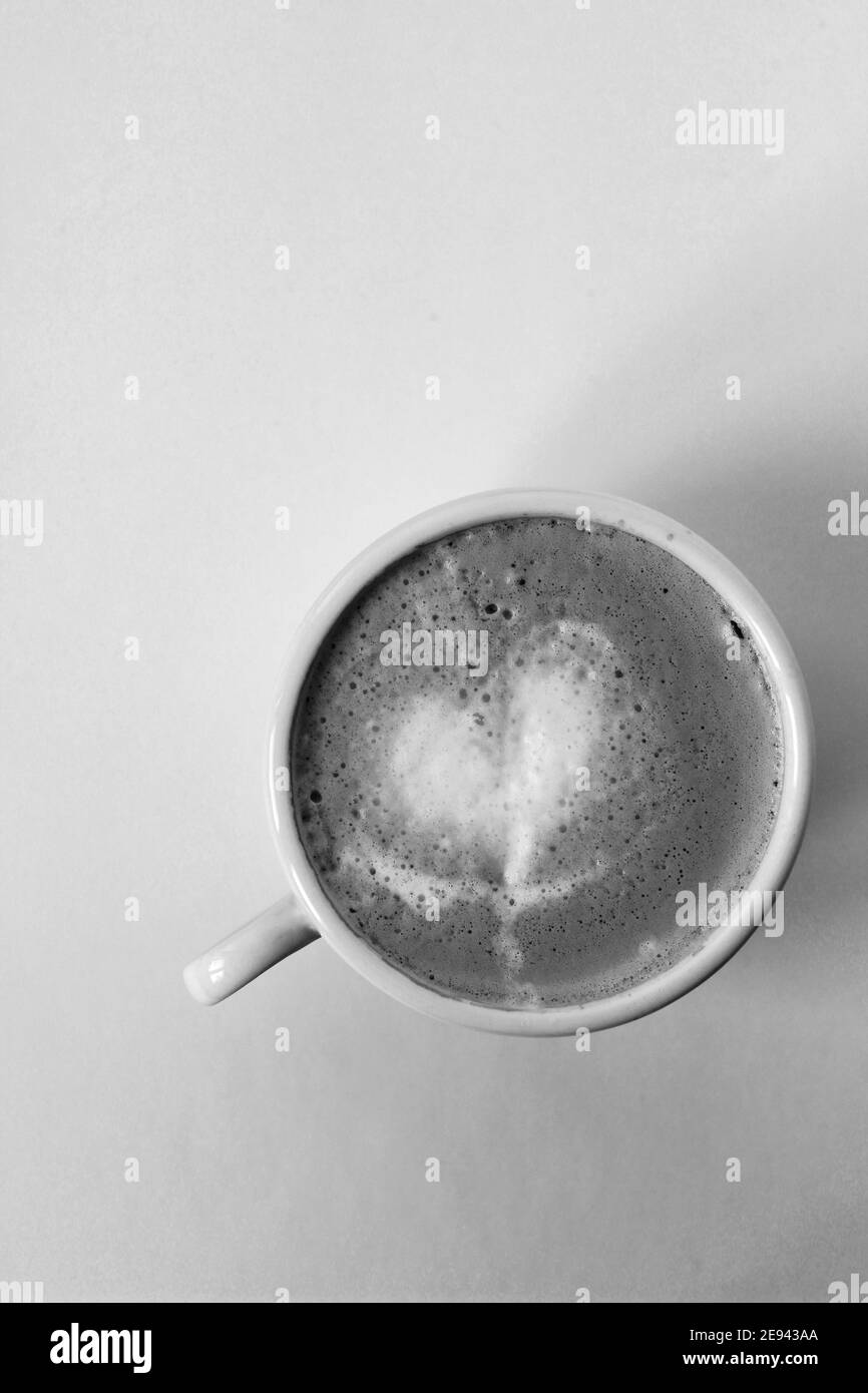 Closeup of Cappuccino with Heart Latte Art. Freshly Made Coffee. Stock Photo