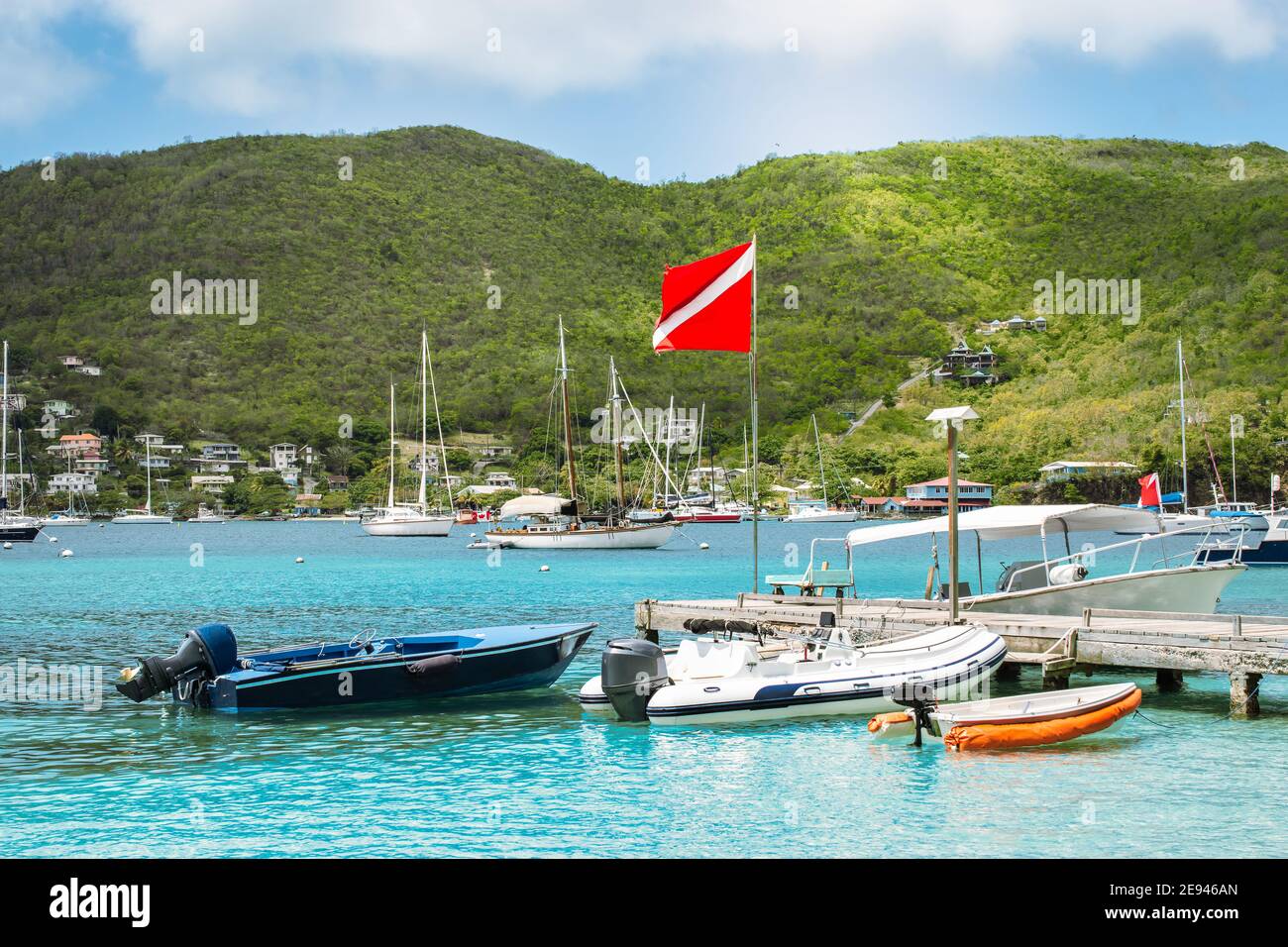 Boats in the harbor of Bequia, St Vincent and the Grenadines. Stock Photo