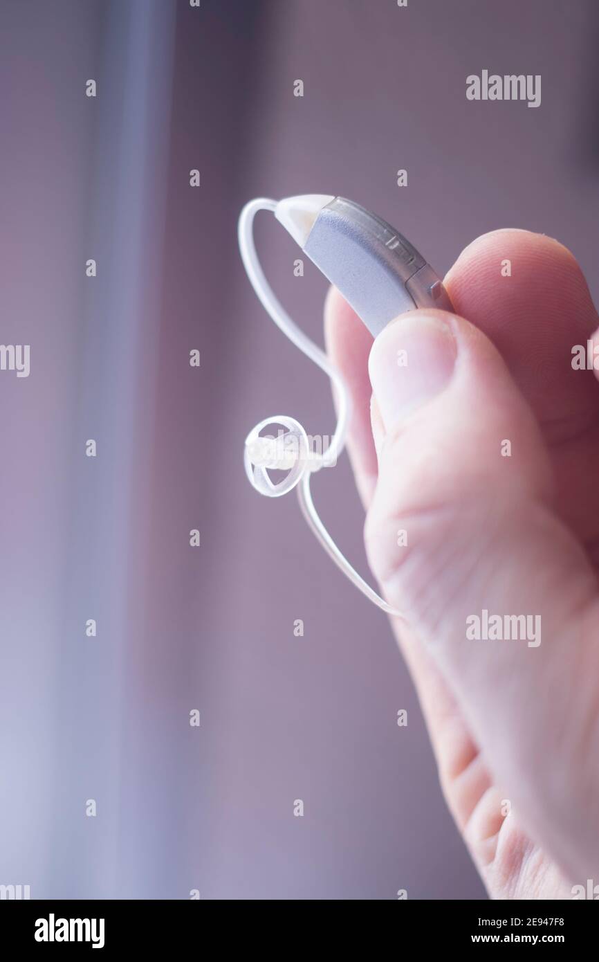 Digital modern technology for deaf people micro hearing aid Stock Photo