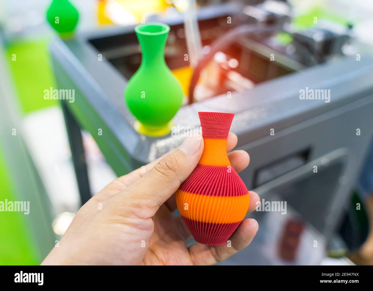 hand with vase closeup object printed 3d printer close-up. Progressive ...