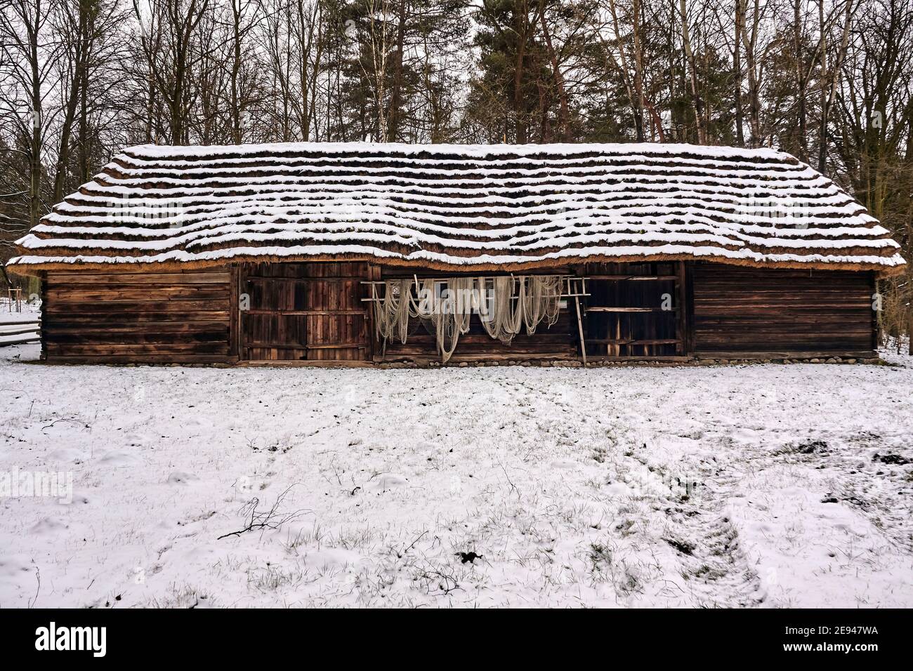 Radom, Poland -  January 15, 2021. Old wooden barn from Makosy Nowe village in Radom Village Museum. Stock Photo