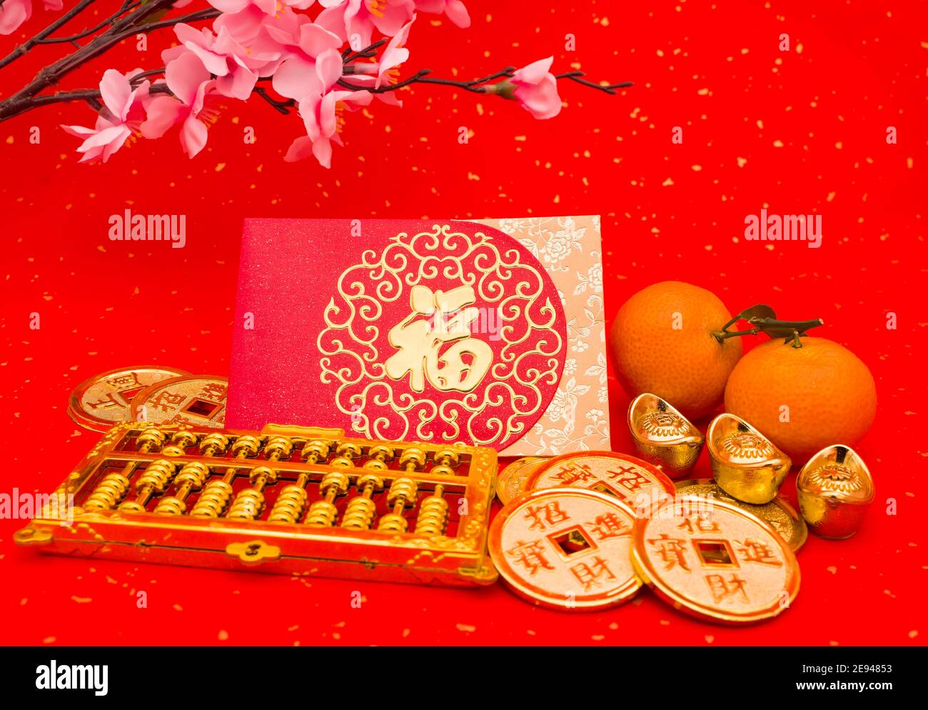 Chinese new year ornament--gold ingot and golden abacus,Chinese calligraphy Translation:good bless for new year Stock Photo