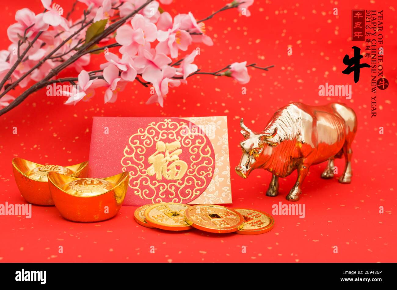 Tradition Chinese 2021 is year of the ox,Chinese characters on rightside mesn chinese wording and seal mean:Chinese calendar for the year.leftside and Stock Photo