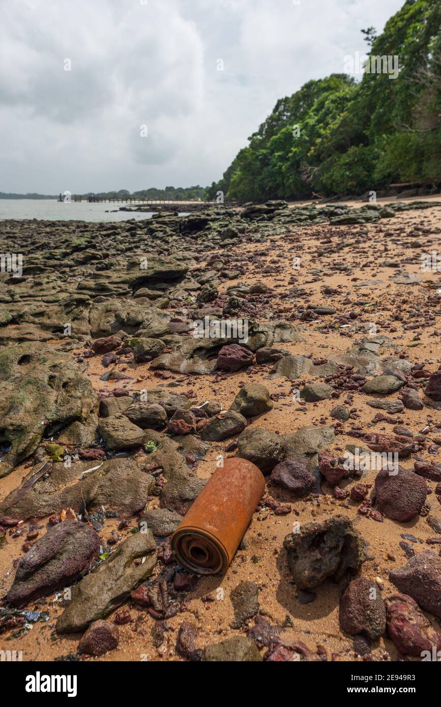 Metallic garbage disposed in nature at Caripi beach in the Amazon Region of Barcarena, Pará State, Northern Brazil. Stock Photo
