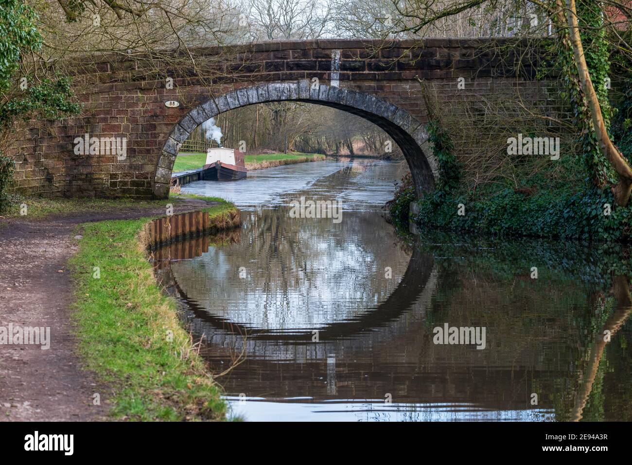 A single narrowboat moored on the Leeds Liverpool canal at Withnell Fold in Lancashire Stock Photo