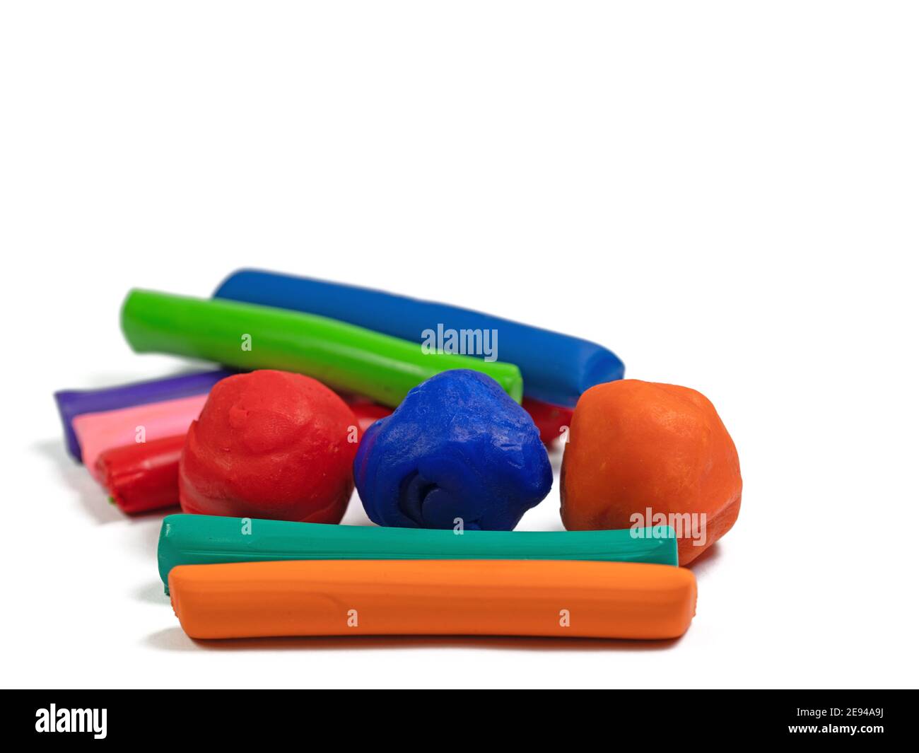 Colorful plasticine against a white background Stock Photo