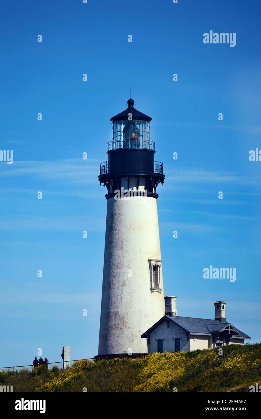 The historic Yaquina Head Light, also known as the Cape Foulweather Lighthouse, overlooking the Pacific Ocean near Newport, Oregon. Stock Photo