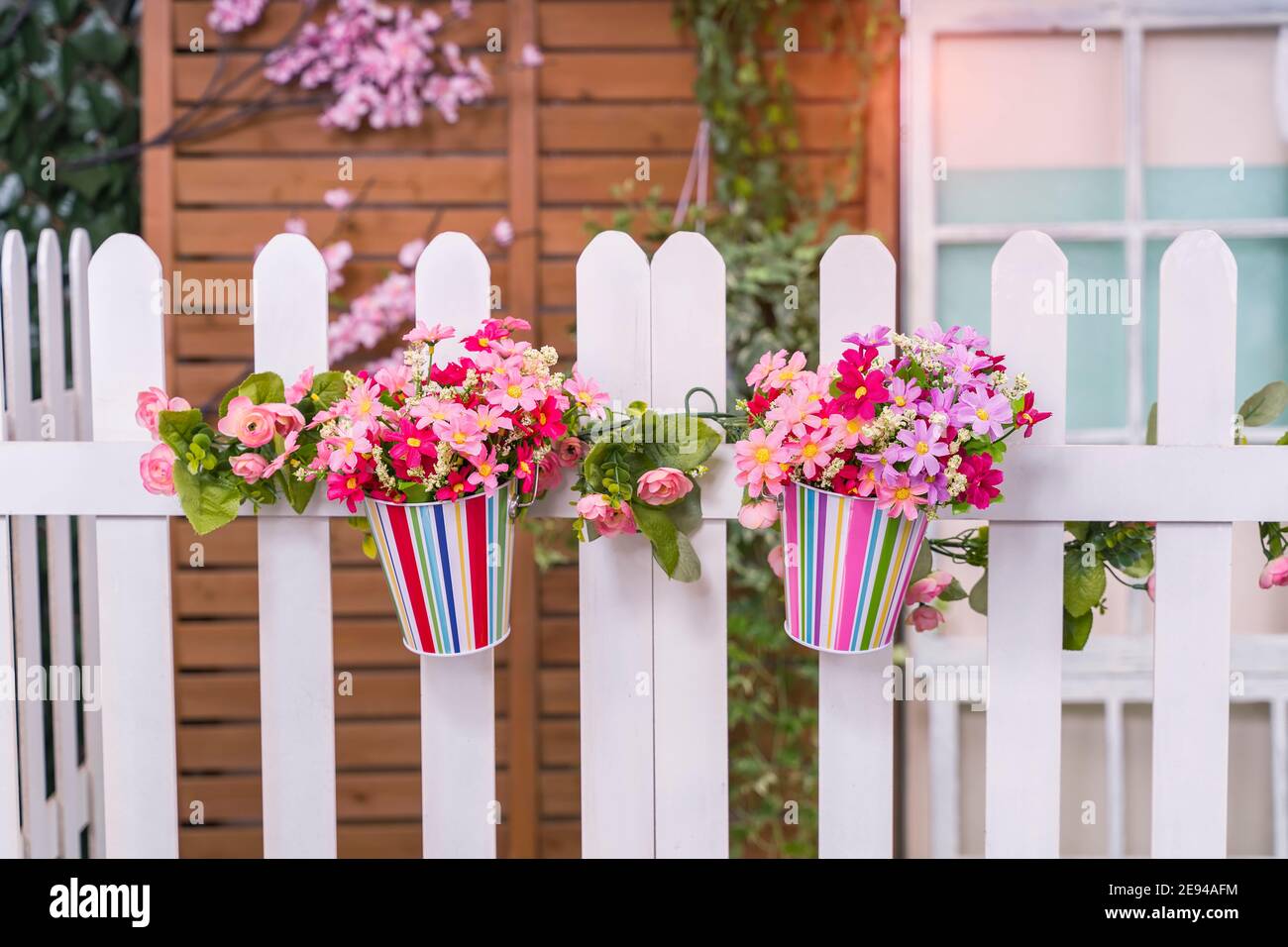 Hanging Flower Pots with fence Stock Photo Alamy