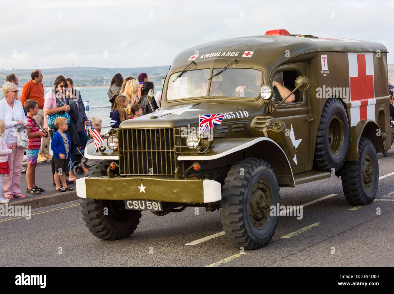 War personnel and Ambulance vehicle takes part in Weymouth Carnival at Weymouth, Dorset UK in August Stock Photo