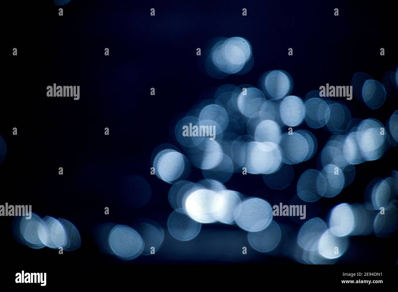 Blue elegant abstract background with bokeh lights image,reflection of sun on a water Stock Photo