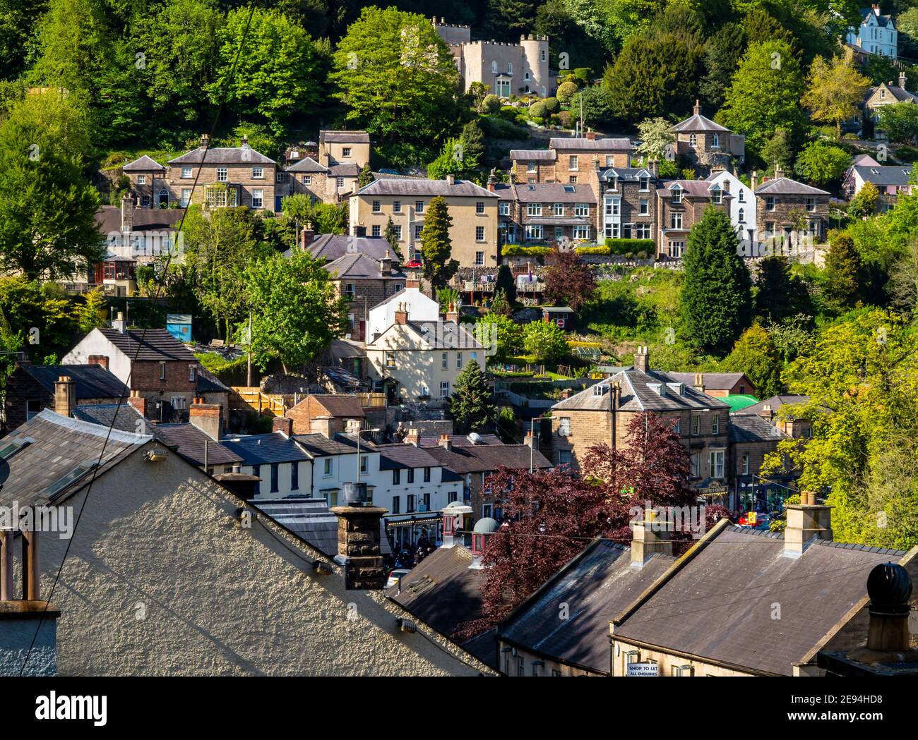 Houses on the hillside at Matlock Bath a popular tourist village in the Derbyshire Dales area of the Peak District England UK Stock Photo